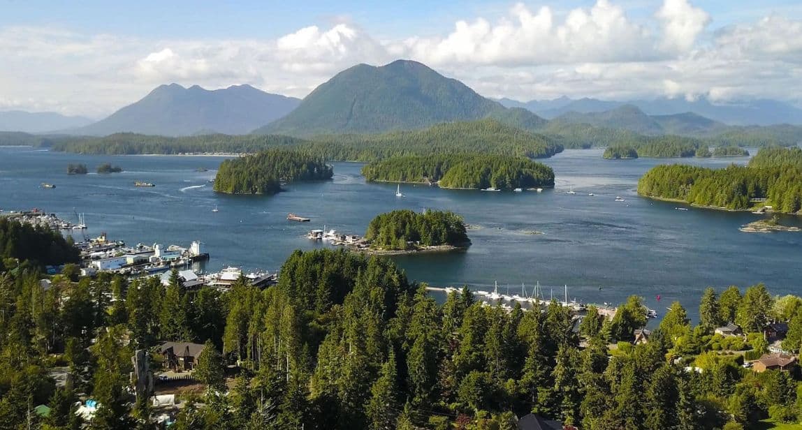 Scenic coastal view with mountains and islands.