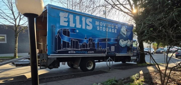 Ellis Moving truck parked on street.